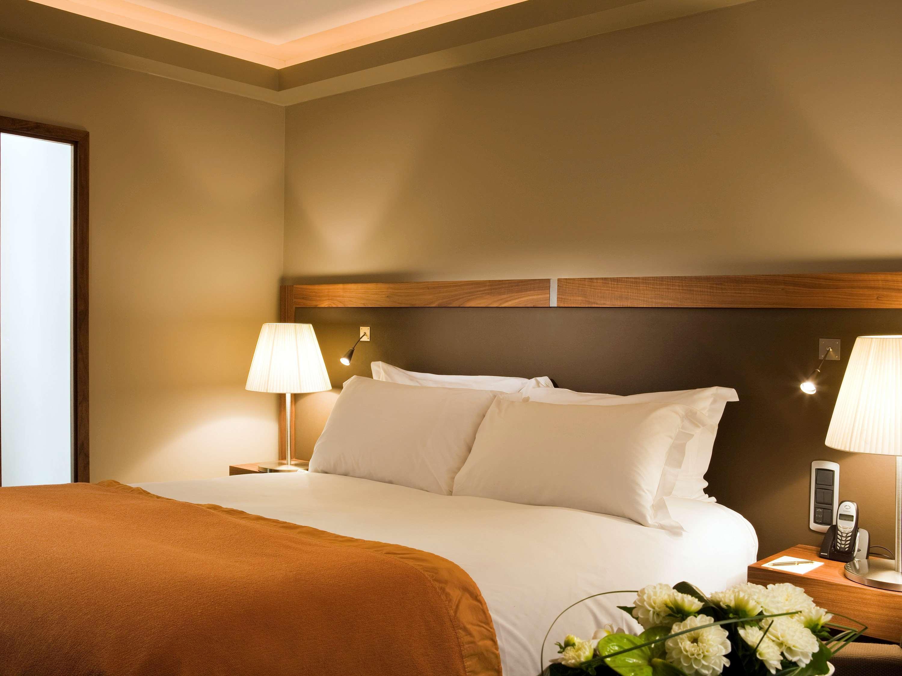 索菲特里昂贝勒库尔酒店 外观 照片 A bedroom at the hotel