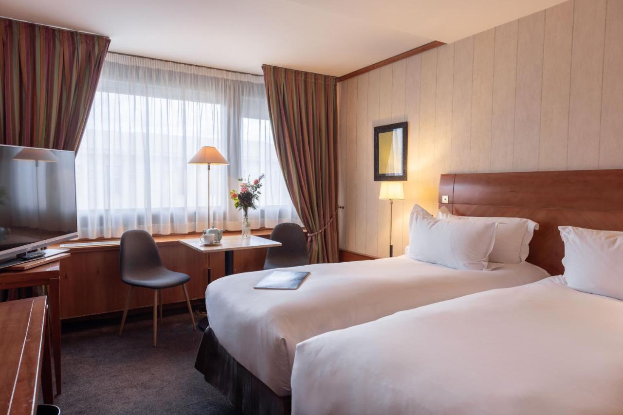 索菲特里昂贝勒库尔酒店 外观 照片 A typical room at the hotel