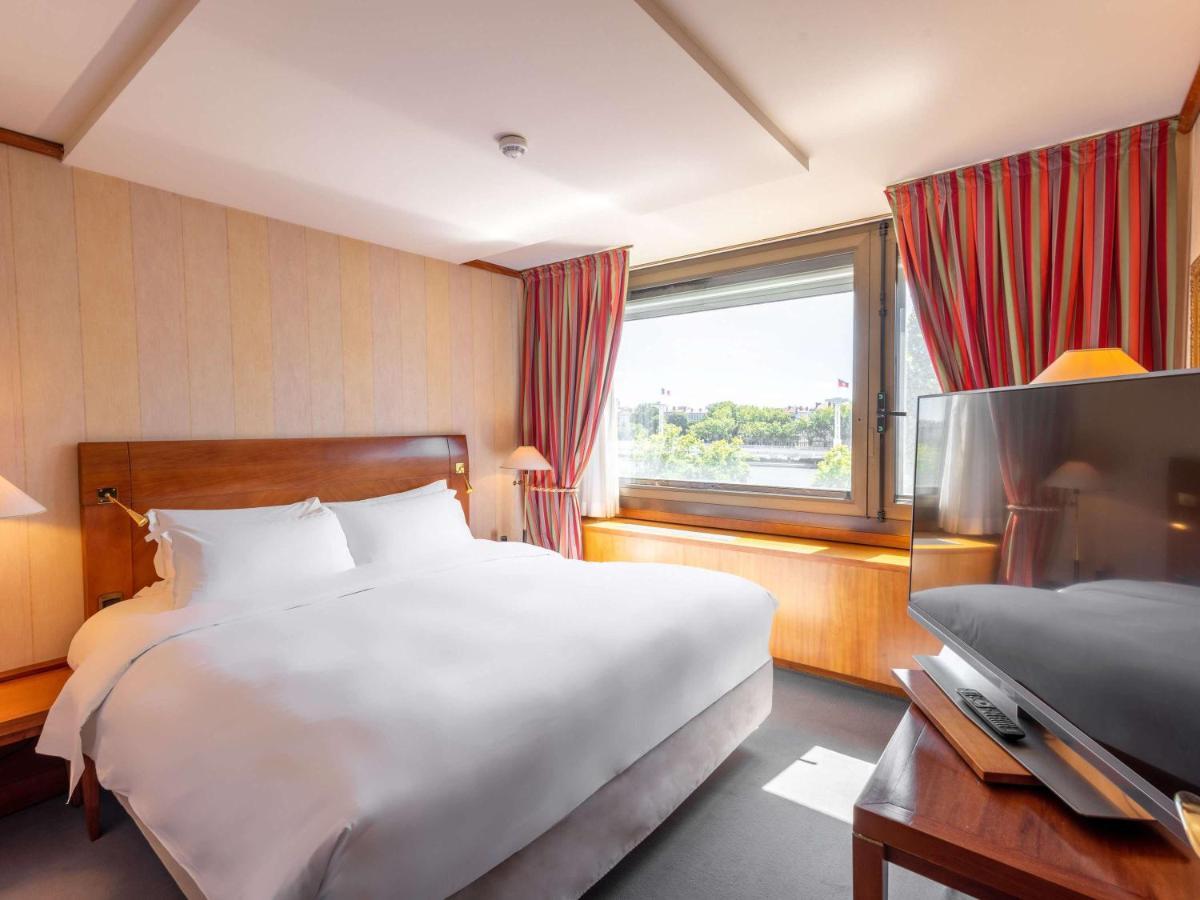 索菲特里昂贝勒库尔酒店 外观 照片 A room at the hotel