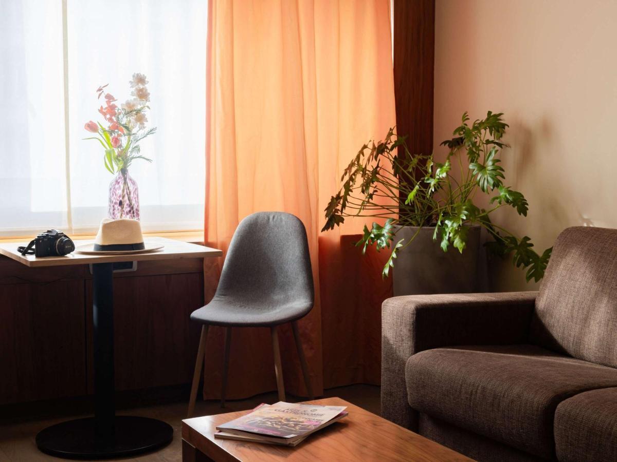 索菲特里昂贝勒库尔酒店 外观 照片 A room at the hotel